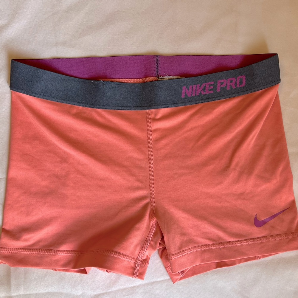 Nike dri-fit shorts size M. Peach color
